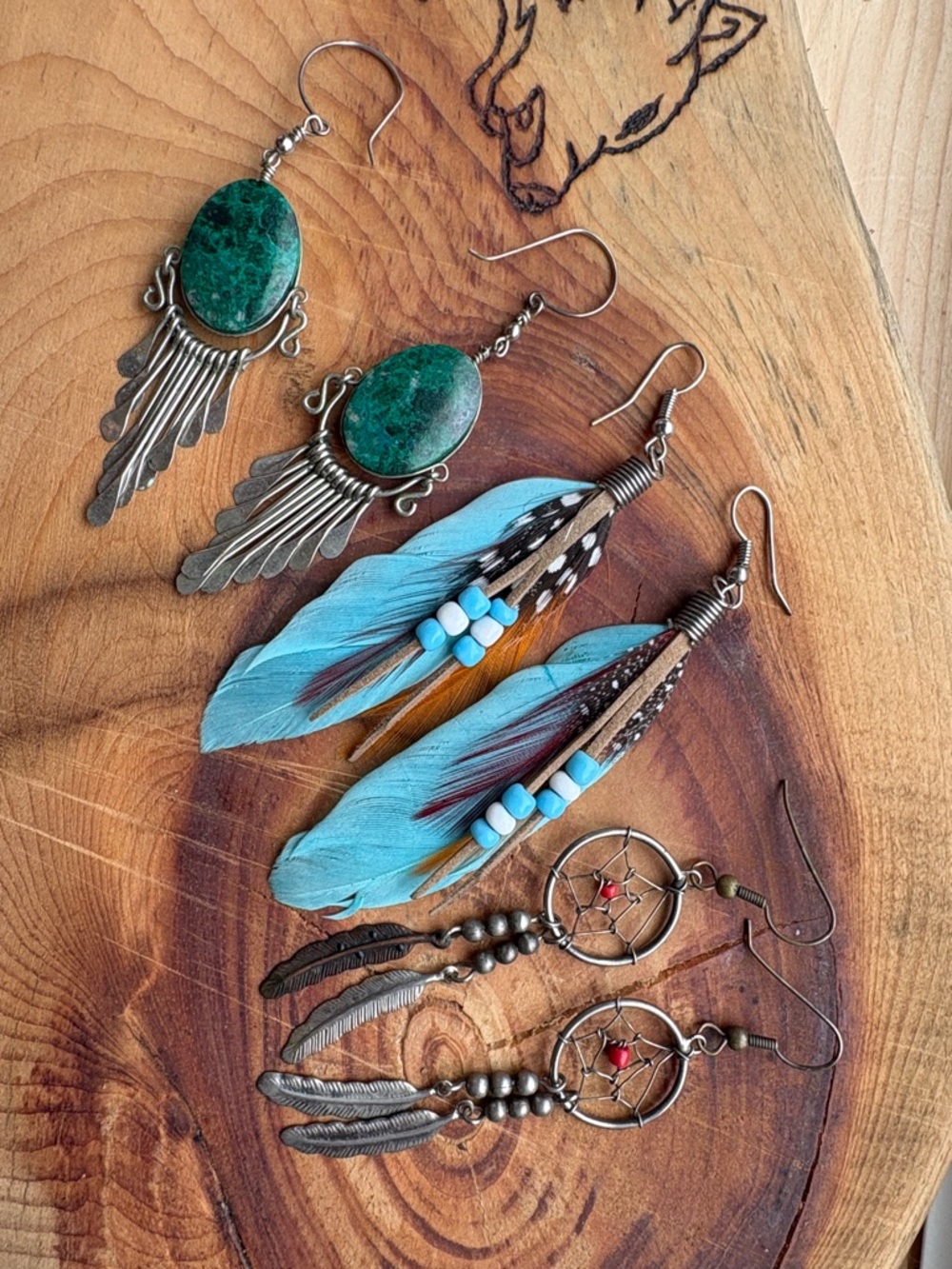 3 pairs drop earrings. Dream catcher, real feathers; green stone hammered metal.